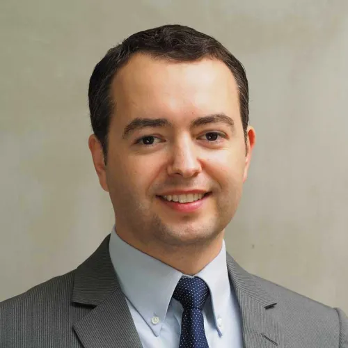 Jason Garcia, Senior Deputy Compliance Officer.